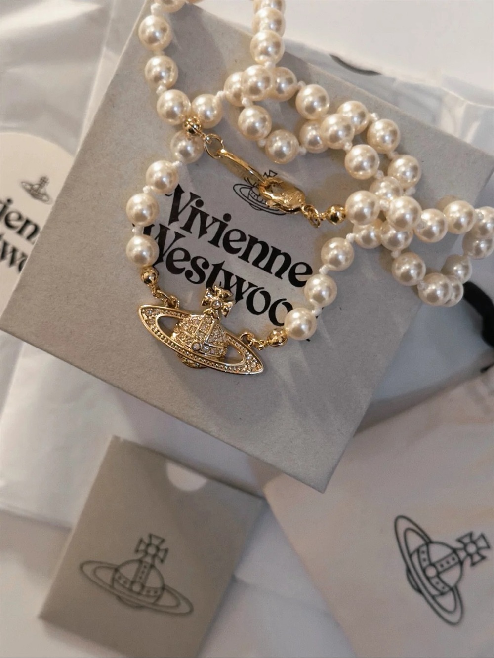 Vivienne Westwood Gold Orb Pearl Necklace with Ivory Beads